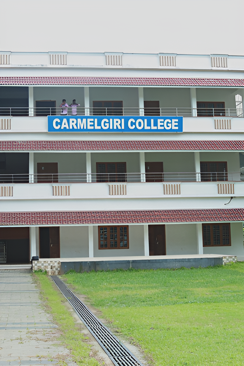 Faculty mentoring students at Carmelgiri College for holistic development